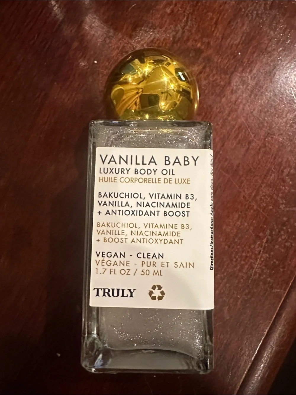 TRULY Vanilla Baby Luxury Body Oil — Clear Bottle with Gold Cap